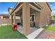 Inviting backyard featuring green turf, patio, and outdoor cooking at 397 Purple Sandpiper St, Las Vegas, NV 89138