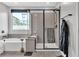 Bathroom showcasing separate shower and soaking tub under natural light from a window at 397 Purple Sandpiper St, Las Vegas, NV 89138