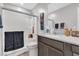 Bathroom featuring shower over tub with glass door and vanity with storage at 397 Purple Sandpiper St, Las Vegas, NV 89138