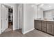 Bright bathroom featuring a shower, soaking tub, and ample vanity storage at 397 Purple Sandpiper St, Las Vegas, NV 89138