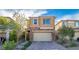 Attractive two-story home with stone accents and a brick driveway in a well-kept neighborhood at 397 Purple Sandpiper St, Las Vegas, NV 89138