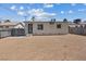 View of the back exterior with a large, blank canvas backyard with fencing at 429 N 10Th St, Las Vegas, NV 89101
