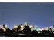 Night view of the dazzling city skyline, featuring iconic hotels and palm trees at 4809 S Torrey Pines Dr # 201, Las Vegas, NV 89103