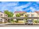 Condominium complex featuring covered parking and landscaping at 4809 S Torrey Pines Dr # 201, Las Vegas, NV 89103