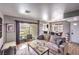 Cozy living room with a sliding glass door and comfortable seating, perfect for relaxation at 4809 S Torrey Pines Dr # 201, Las Vegas, NV 89103