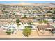 An aerial view displays homes with solar panels and landscaping, in a well-established residential neighborhood at 525 Engel Ave, Henderson, NV 89011