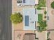 An aerial view of the home showcasing the roof, solar panels, backyard, and the surrounding neighborhood layout at 525 Engel Ave, Henderson, NV 89011