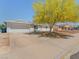 Single-story home showcasing a wide driveway and xeriscaped front yard at 525 Engel Ave, Henderson, NV 89011