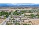 Aerial view of lush desert neighborhood featuring various desert landscaping at 5890 W Patrick Ln, Las Vegas, NV 89118