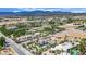 Aerial view of lush desert neighborhood featuring various desert landscaping at 5890 W Patrick Ln, Las Vegas, NV 89118