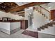 Basement bar area with vintage finishes and wood trim, situated near staircase at 5890 W Patrick Ln, Las Vegas, NV 89118