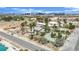 Expansive single-story homes nestled among lush palm trees and landscaping with a beautiful Las Vegas cityscape view at 5890 W Patrick Ln, Las Vegas, NV 89118