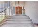 Main entrance features a set of stairs up to the front door at 5890 W Patrick Ln, Las Vegas, NV 89118
