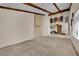 Living room features wood beamed ceilings and an open concept floor plan at 5890 W Patrick Ln, Las Vegas, NV 89118
