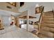 Split level living space with tile flooring and access to the backyard at 5890 W Patrick Ln, Las Vegas, NV 89118