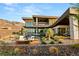Beautiful backyard featuring a fire pit, desert landscaping, and modern architectural design, enhancing outdoor enjoyment at 6 Vista Crescent Ct, Henderson, NV 89012