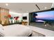 Bright bedroom with floor-to-ceiling windows and access to outdoor pool and city views at 6 Vista Crescent Ct, Henderson, NV 89012