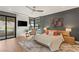 Serene bedroom with a private balcony, modern furniture, and contemporary decor at 6 Vista Crescent Ct, Henderson, NV 89012