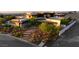 Modern home with desert landscaping and a stone pathway to the entrance at 6 Vista Crescent Ct, Henderson, NV 89012