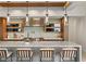 Close-up of the kitchen island showcasing the marble countertop, pendant lighting, and modern design at 6 Vista Crescent Ct, Henderson, NV 89012