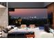 Living room with city skyline views and fireplace at 6 Vista Crescent Ct, Henderson, NV 89012