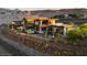 Modern home with a private pool, multiple patios and scenic mountain views at 6 Vista Crescent Ct, Henderson, NV 89012