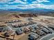 New homes in a desert community with desert landscaping and mountain views at 647 Quarry Pass, Mesquite, NV 89034