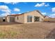 Wide gravel backyard and patio, perfect for outdoor relaxation or personalized garden design at 647 Quarry Pass, Mesquite, NV 89034