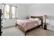 Cozy bedroom with a warm and inviting atmosphere, featuring a window with natural light at 647 Quarry Pass, Mesquite, NV 89034