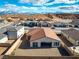 Well-maintained single-Gathering home with desert landscaping and an attached two-car garage at 647 Quarry Pass, Mesquite, NV 89034