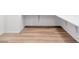 Spacious walk-in closet with built-in shelving and wood flooring for efficient organization at 647 Quarry Pass, Mesquite, NV 89034