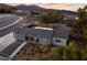 Aerial view of a single-story home with desert landscaping and mountain views at 650 Arizona St, Boulder City, NV 89005