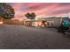 Expansive backyard with fence, patio, and desert landscaping ready for outdoor enjoyment at 650 Arizona St, Boulder City, NV 89005