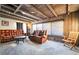 Comfortable living room with wood ceilings and recliner seating providing the perfect place to relax at 650 Arizona St, Boulder City, NV 89005