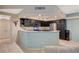 Bright kitchen with stainless steel appliances, tile floors, and granite countertops at 6916 Dorita Ave # 101, Las Vegas, NV 89108