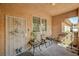 Cozy covered patio with stylish seating, ideal for relaxation and enjoying the outdoors at 6916 Dorita Ave # 101, Las Vegas, NV 89108
