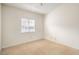 Bright bedroom with carpet flooring, one window, and ceiling fan at 7140 Pascal Dr, Las Vegas, NV 89156