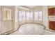 Corner dining area with lots of light and tile floors at 7140 Pascal Dr, Las Vegas, NV 89156