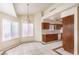 Dining room with decorative chandelier and lots of light near the kitchen area at 7140 Pascal Dr, Las Vegas, NV 89156