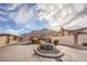 Community entrance with mountain views, gated entry and desert landscaping at 7140 Pascal Dr, Las Vegas, NV 89156
