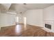 Large living room with vaulted ceilings and a cozy marble fireplace at 7140 Pascal Dr, Las Vegas, NV 89156