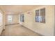 Enclosed sunroom featuring tile flooring and large windows that bring in lots of natural light at 7140 Pascal Dr, Las Vegas, NV 89156