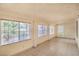 Bright sunroom featuring tile flooring and large windows providing natural light at 7140 Pascal Dr, Las Vegas, NV 89156