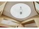 View of an interior ceiling dome with decorative hanging light fixture at 7307 Lansbrook Ave, Las Vegas, NV 89131