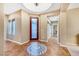 Welcoming foyer with decorative tile flooring and ample natural light at 7307 Lansbrook Ave, Las Vegas, NV 89131