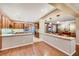 Well-appointed kitchen with stainless steel appliances and wood cabinetry at 7307 Lansbrook Ave, Las Vegas, NV 89131