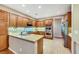 Modern kitchen with stainless steel appliances, tile backsplash, and center island at 7307 Lansbrook Ave, Las Vegas, NV 89131