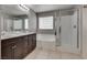 Bathroom with a soaking tub, shower, and dual sink vanity for spa-like experience at 7559 Chimney Point Ct, Las Vegas, NV 89166