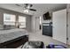 Primary bedroom features a ceiling fan, TV, and neutral tones for a comforting atmosphere at 7559 Chimney Point Ct, Las Vegas, NV 89166