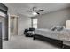 Bedroom with a ceiling fan and neutral color palette provides a cozy retreat at 7559 Chimney Point Ct, Las Vegas, NV 89166